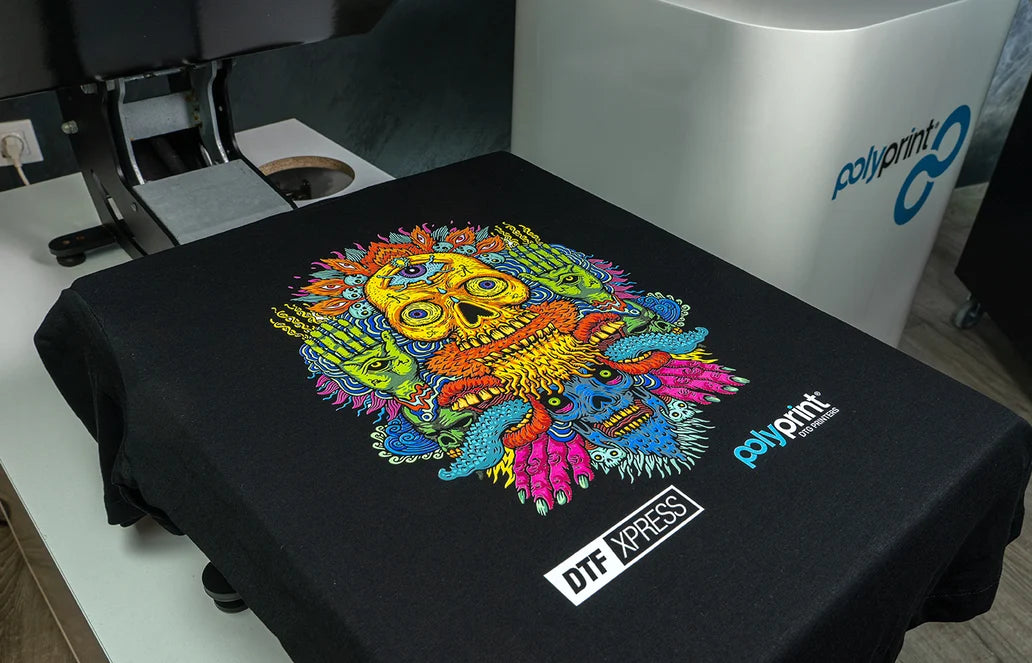 Colorful custom printed design on a black T-shirt using a Direct to Film (DTF) printing machine, showcasing vibrant graphics and fine details.